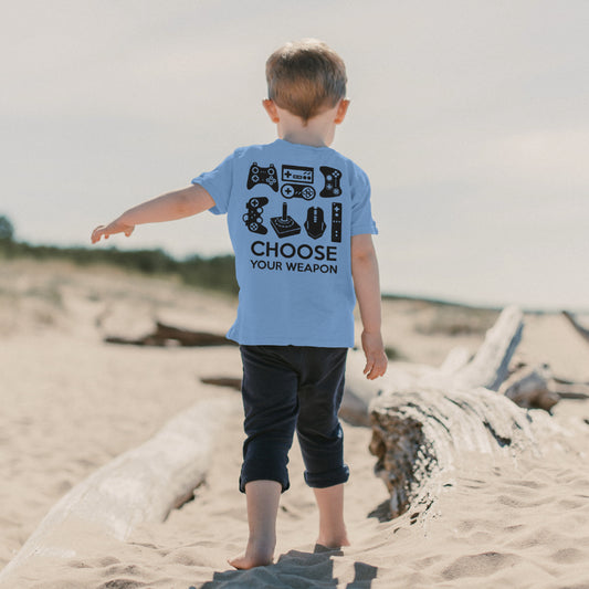 Black gaming silhouette with PS3, Atari, Wii, and Nintendo controllers