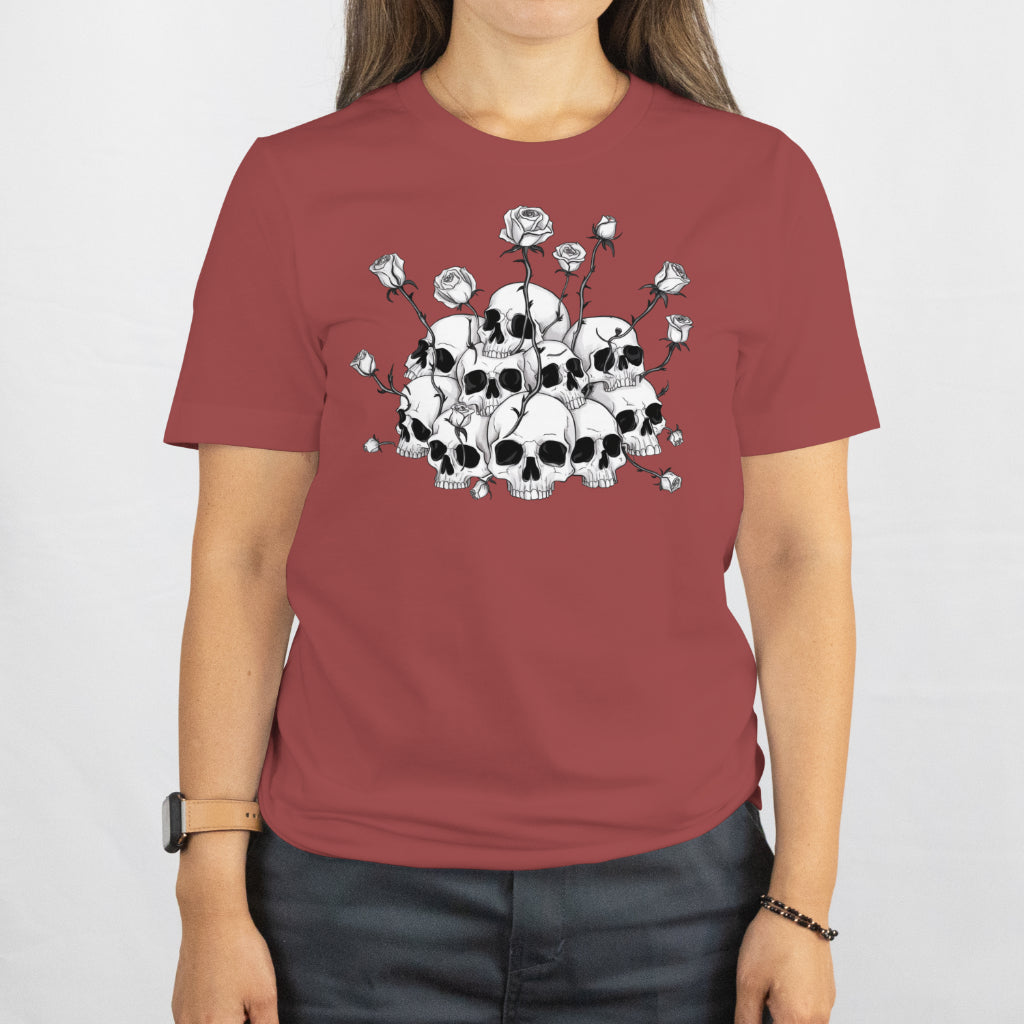 Dark romantic art featuring skulls and blooming roses