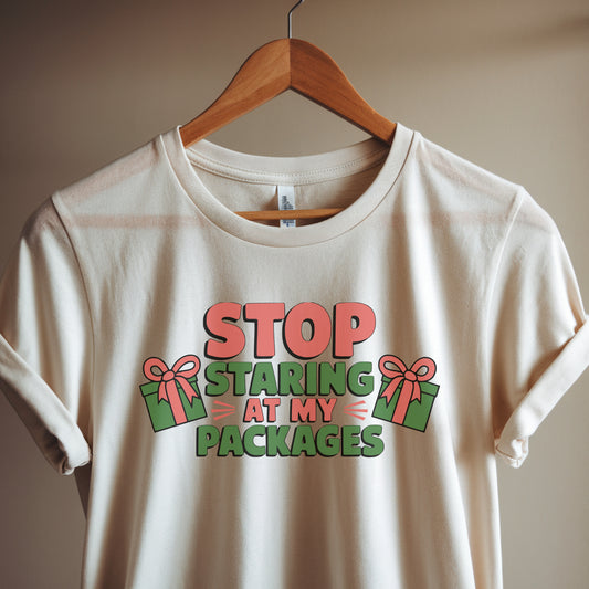 Clean white t-shirt on hanger mockup with beige wall background