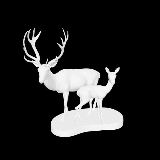 Deer sculpture with large antlered buck and smaller doe