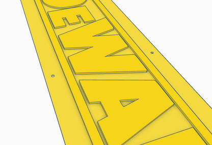 3D printable Dewalt tool sign with wall-mounting holes.
