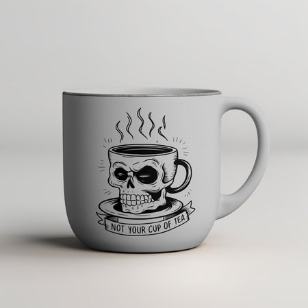 "Gothic-themed coffee cup art with skull design and humorous typography."