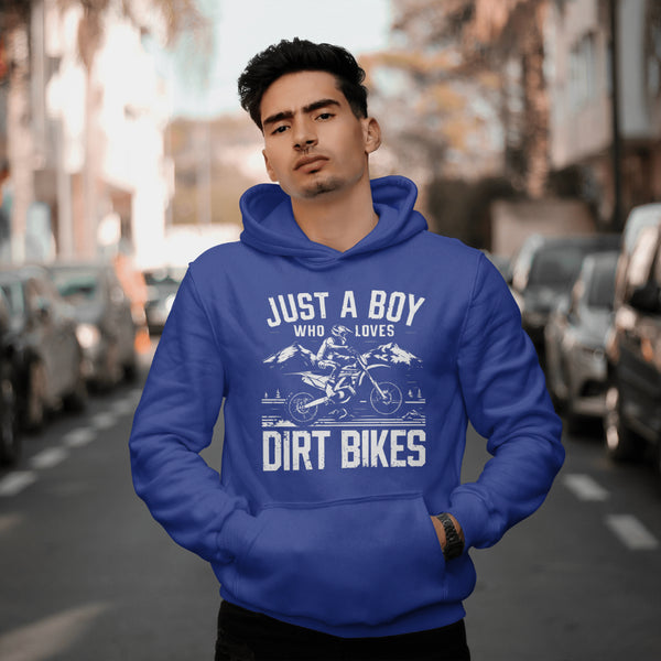 "Boy Riding Dirt Bike on Mountains Graphic"