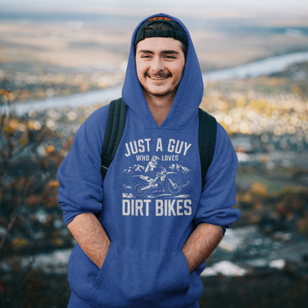 "Guy Riding Dirt Bike on Mountains Graphic"