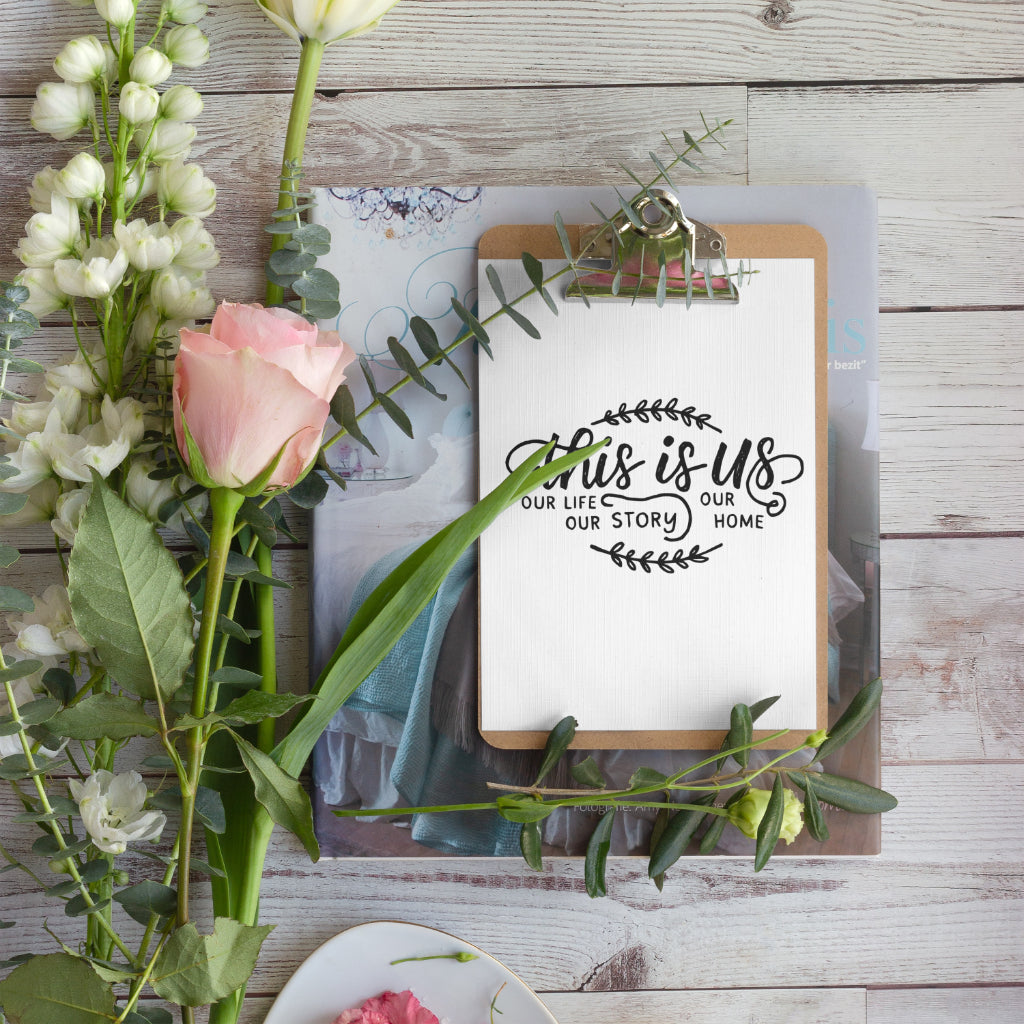 "Black and white family-themed typography illustration with natural accents."