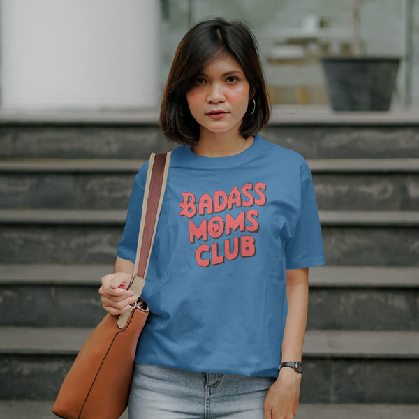 "Cool and edgy 'Badass Moms Club' text in bold red and black."