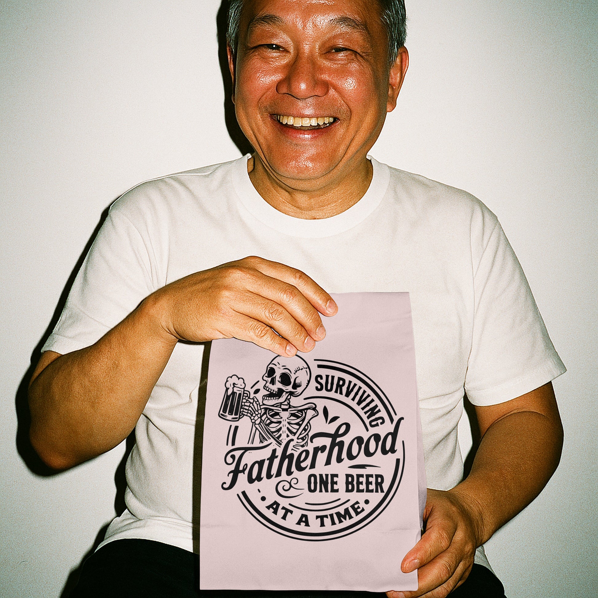 surviving fatherhood png design with humorous twist