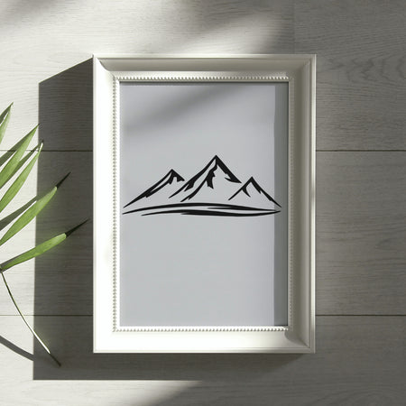 "Stylized black silhouette of mountain peaks for modern branding."