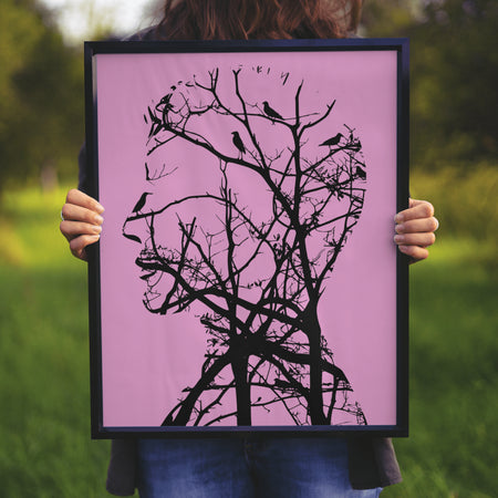 "Intricate Human Profile and Tree Branches Silhouette"