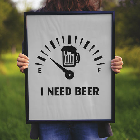 "Speedometer gauge with beer mug graphic showing 'I Need Beer' in black and white."