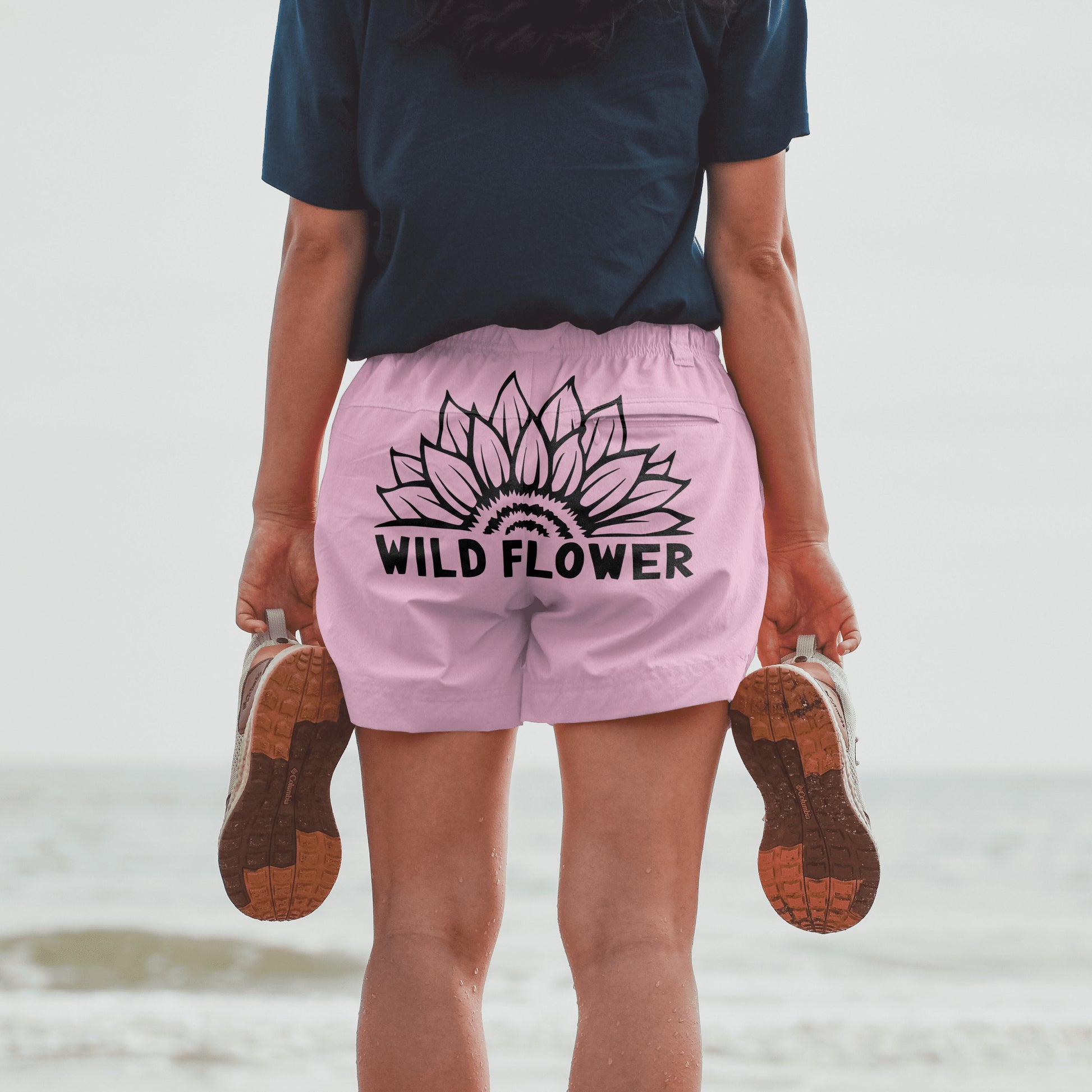 Black and white sunflower graphic with bold text