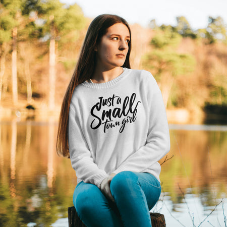 "Casual and laid-back typography art featuring the phrase 'Just A Small Town Girl'."