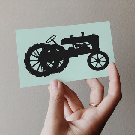 Rustic farm tractor silhouette for DIY crafting projects
