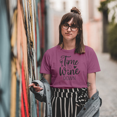 "Playful 'Time to Wine Down' typography with wine glass and heart symbols in black."