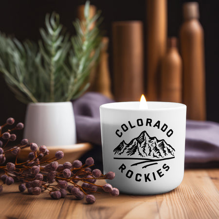 "Black and white Colorado Rockies mountain illustration for tourism and apparel design."