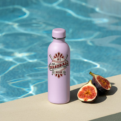 Pink water bottle with 'Baseball Mom' design next to figs by a pool