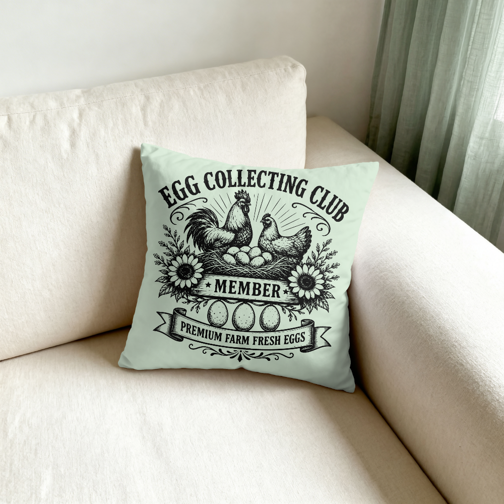 Decorative pillow with 'Egg Collecting Club' design on a beige couch.