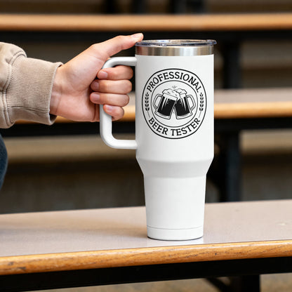 White tumbler with 'Professional Beer Tester' design held by a hand on a wooden table.