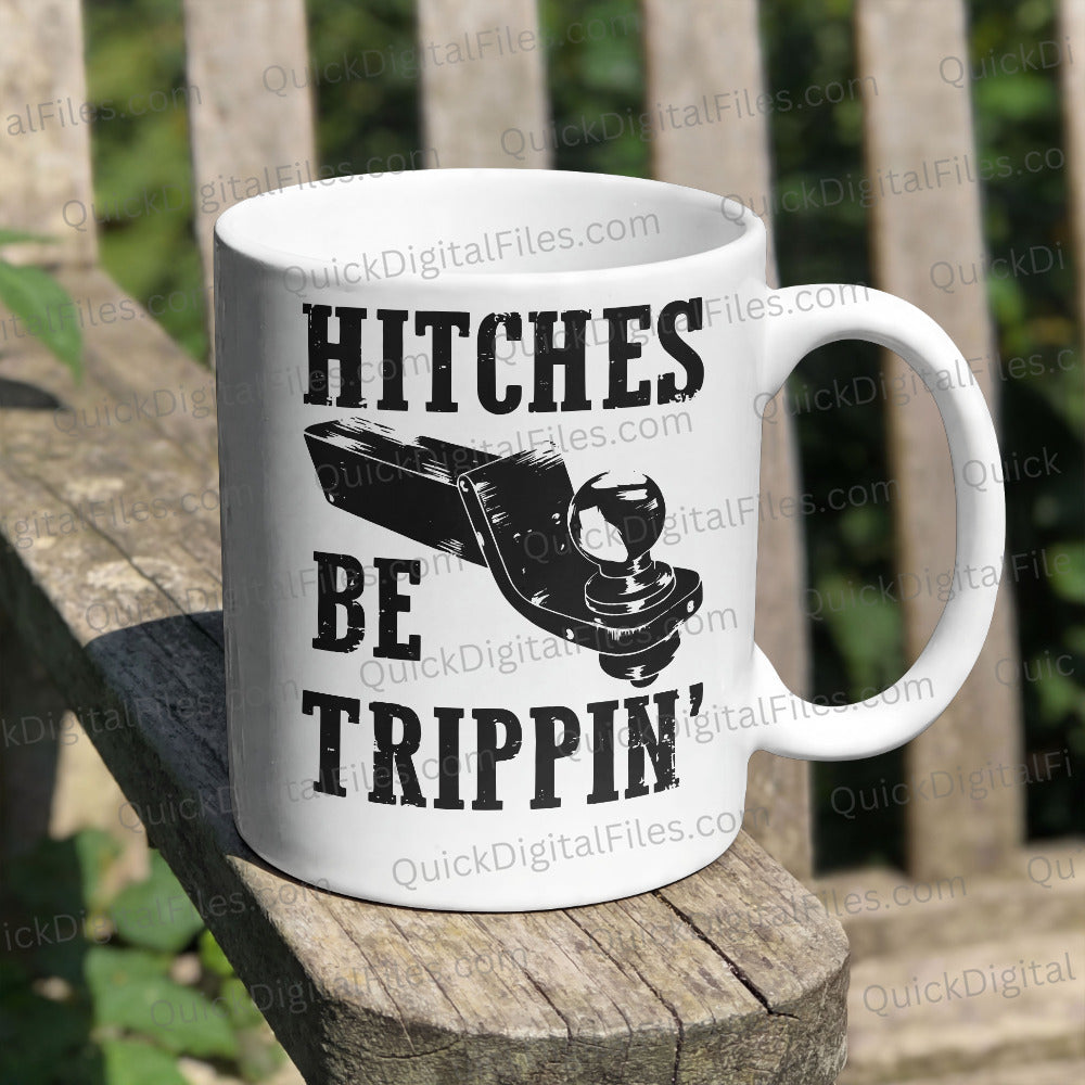 White mug with black text and graphic on a wooden surface outdoors