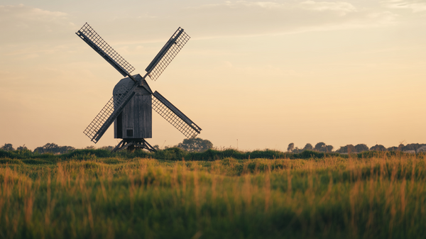 Rural Windmill Over Farm Field – 6s Golden Hour Stock Video