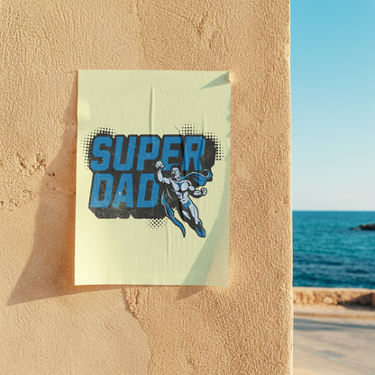 Poster with 'Super Dad' design on a wall by the ocean