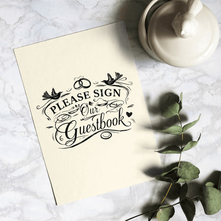 Elegant cursive typography guestbook sign for special occasions.