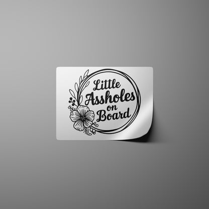 "JPEG of black and white car decal with cheeky parenting phrase."