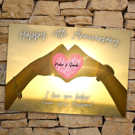 Customizable anniversary card template on Canva with sunset design  heart sunset on beach