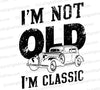 "Vintage car t-shirt design with 'I'm not old, I'm classic' in grunge typography."