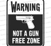 "SVG of warning sign with pistol indicating not a gun-free zone."