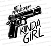 "Handgun graphic with Not a Pepper Spray Kinda Girl text SVG."