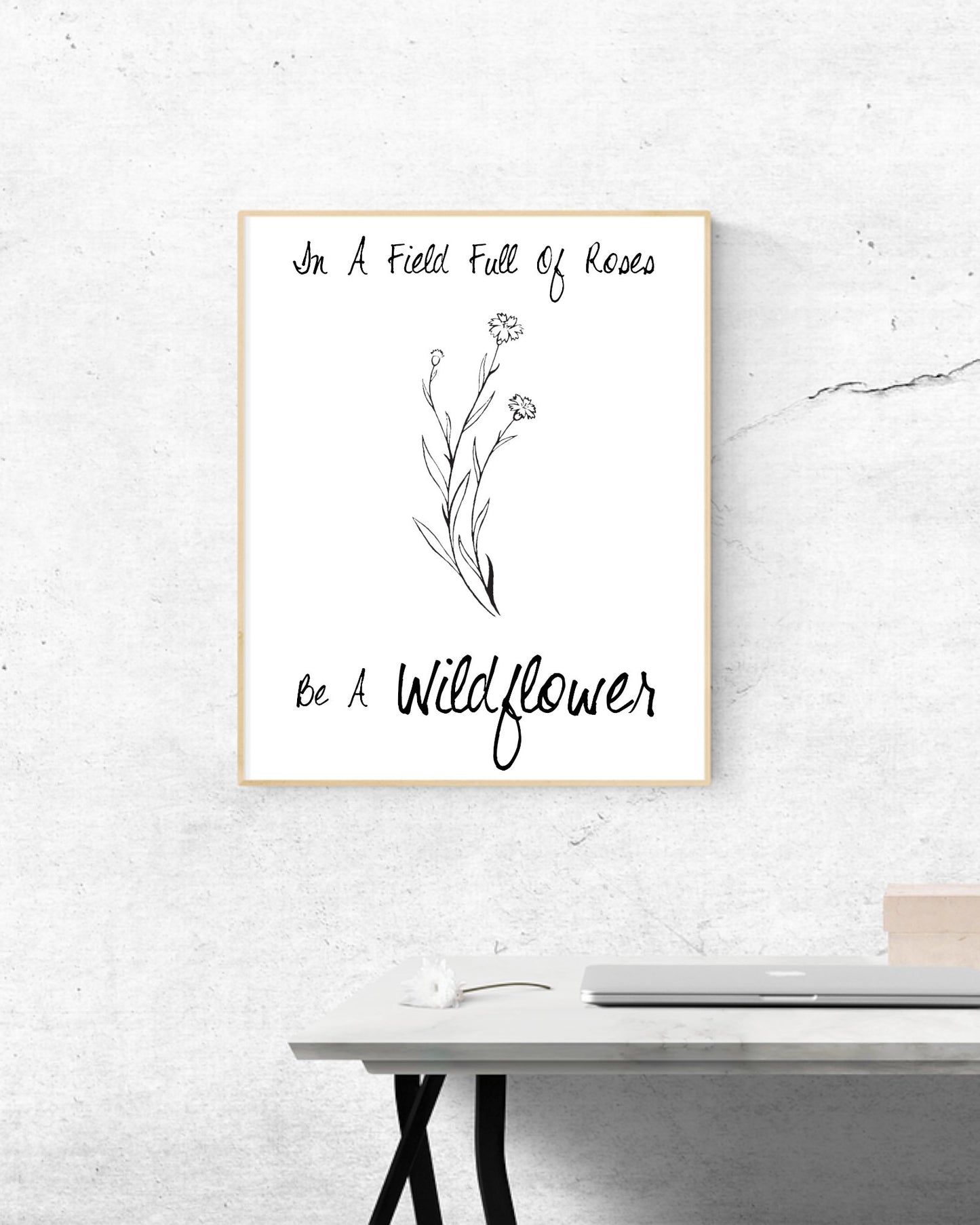 'Be a Wildflower in a field of roses' inspiring black and white digital design.