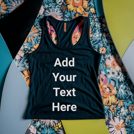 "Fashion design mockup with a black tank top laid on intricate floral fabric."