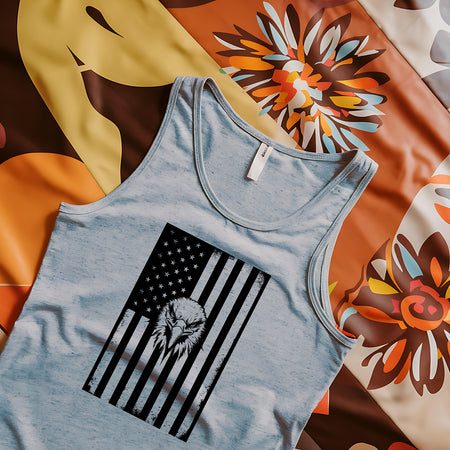 "High-resolution photo of a blank tank top mockup with a colorful floral pattern backdrop."