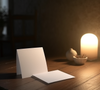 Stationary card mockup on rustic desk with dim lighting PNG