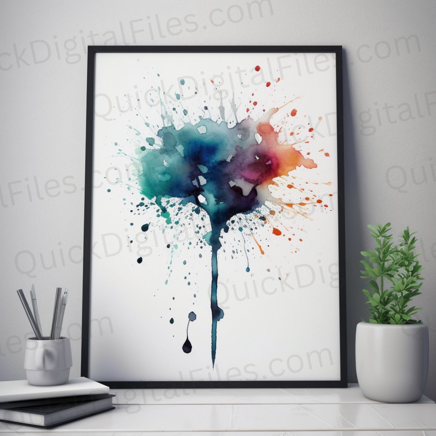 Minimalist watercolor art in frame on desk